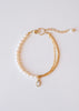 armbandje in wit en goud
