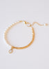 armbandje in wit en goud