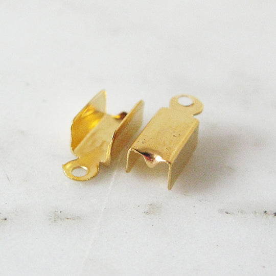 Lederklem 4mm goudkleurig