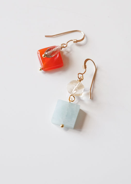 Assymetrische oorstekers met Zahia exclusive edelstenen