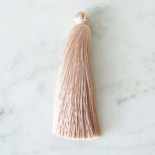 Grote flosj taupe